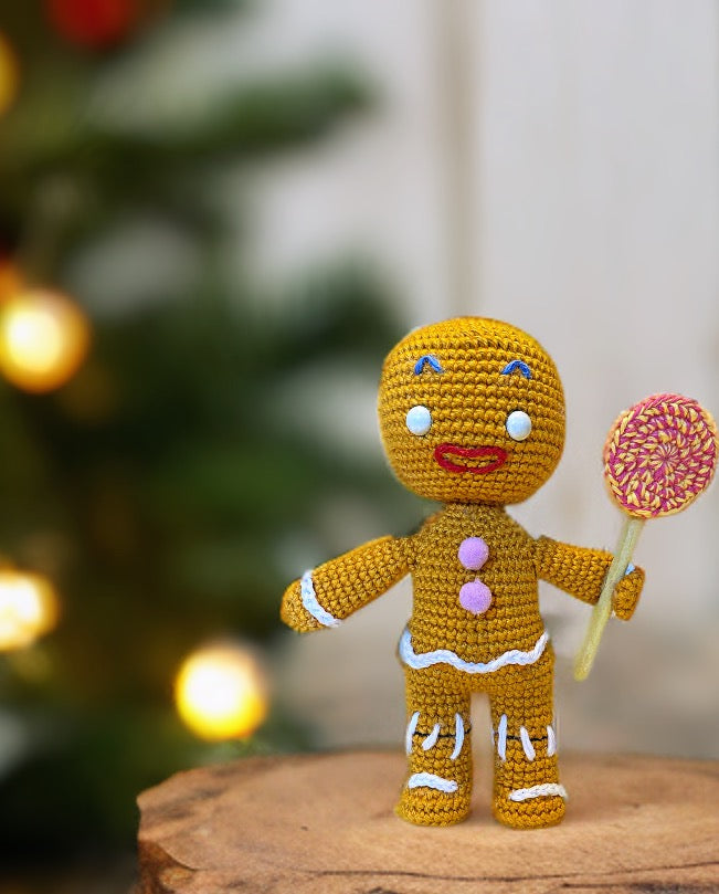Handmade Gingerbread Man amigurumi inspired by Shrek, cute crochet pattern PDF for geek and kawaii fans.