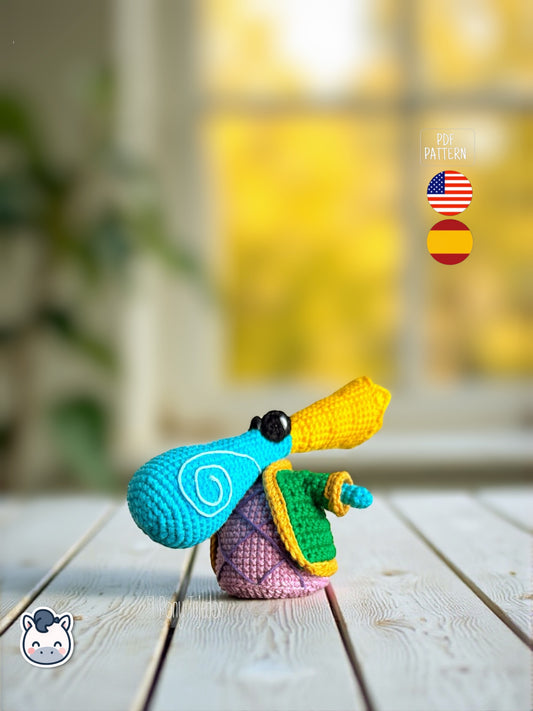 Amigurumi Rayman Diminuto (Teensies) tejido a mano, inspirado en el videojuego Rayman, patrón de crochet mini y colorido para fans gamers y geek.