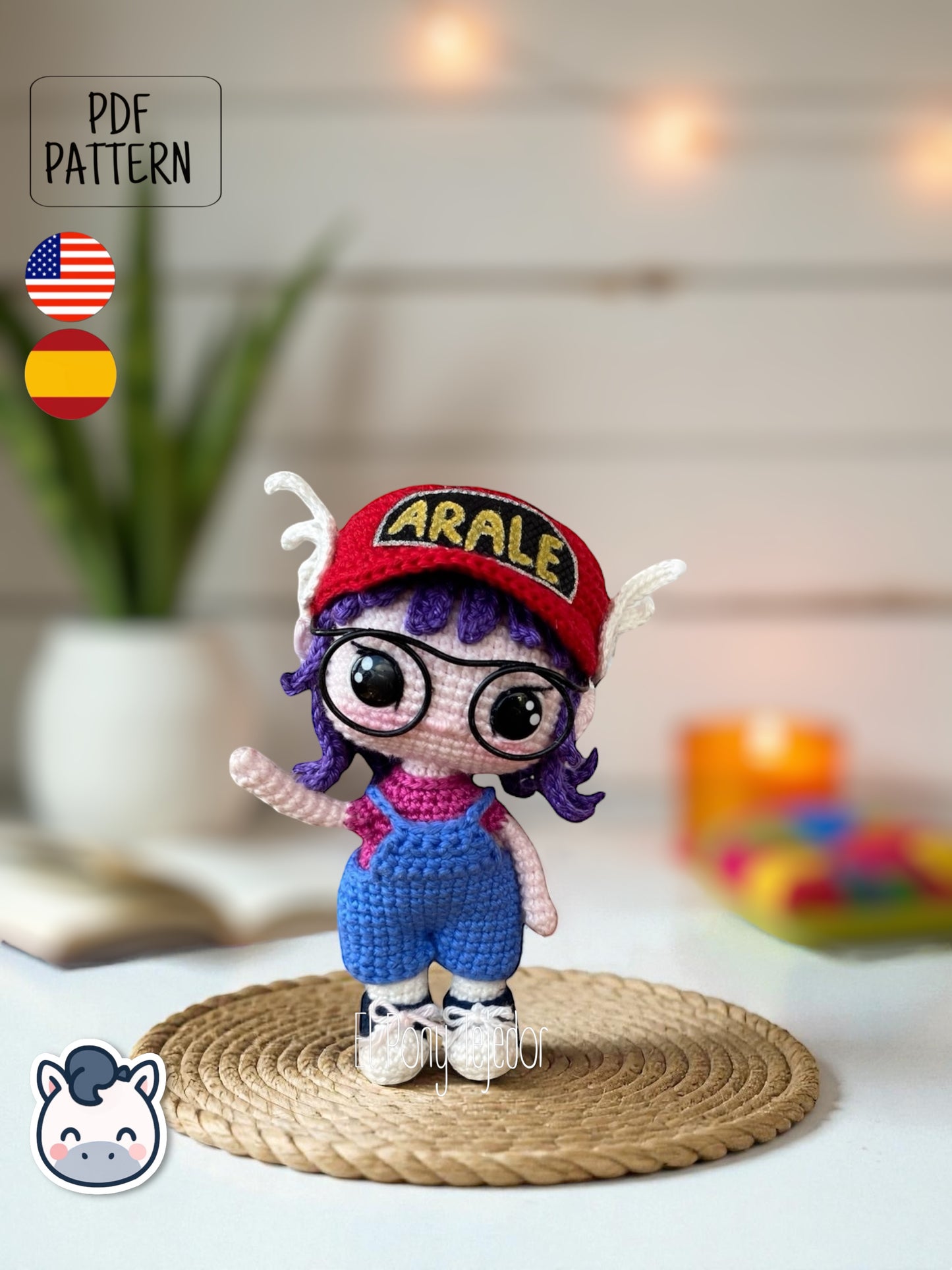 Handmade Arale amigurumi inspired by Akira Toriyama’s Dr. Slump, a perfect crochet pattern for anime, kawaii and manga fans.