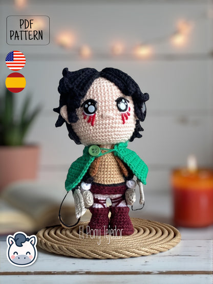 Handmade Eren Jaeger amigurumi inspired by Attack on Titan, a perfect pattern for fans of anime, epic battles, and detailed crochet art.