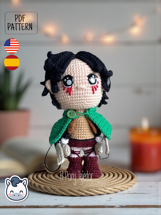Handmade Eren Jaeger amigurumi inspired by Attack on Titan, a perfect pattern for fans of anime, epic battles, and detailed crochet art.