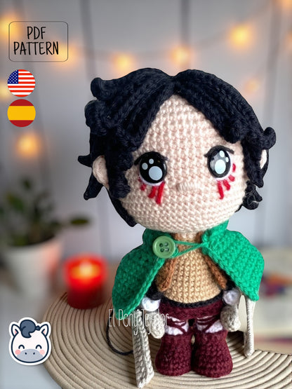 Handmade Eren Jaeger amigurumi inspired by Attack on Titan, a perfect pattern for fans of anime, epic battles, and detailed crochet art.