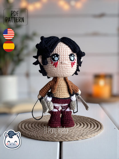 Handmade Eren Jaeger amigurumi inspired by Attack on Titan, a perfect pattern for fans of anime, epic battles, and detailed crochet art.
