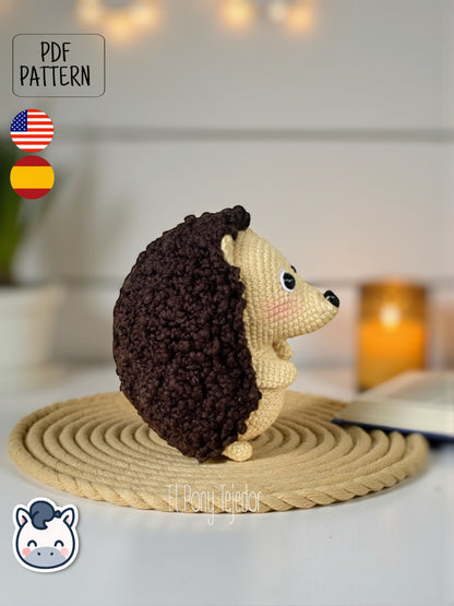 This Hedgehog crochet pattern PDF is a handmade geek amigurumi plush toy inspired by cute woodland animals. This kawaii-style crochet pattern includes a detailed step-by-step photo tutorial to help you create your own adorable spiky hedgehog plush. Perfect for nature lovers, geek collectors, and handmade enthusiasts. Available in English and Spanish as a digital instant download for your next cozy crochet project.