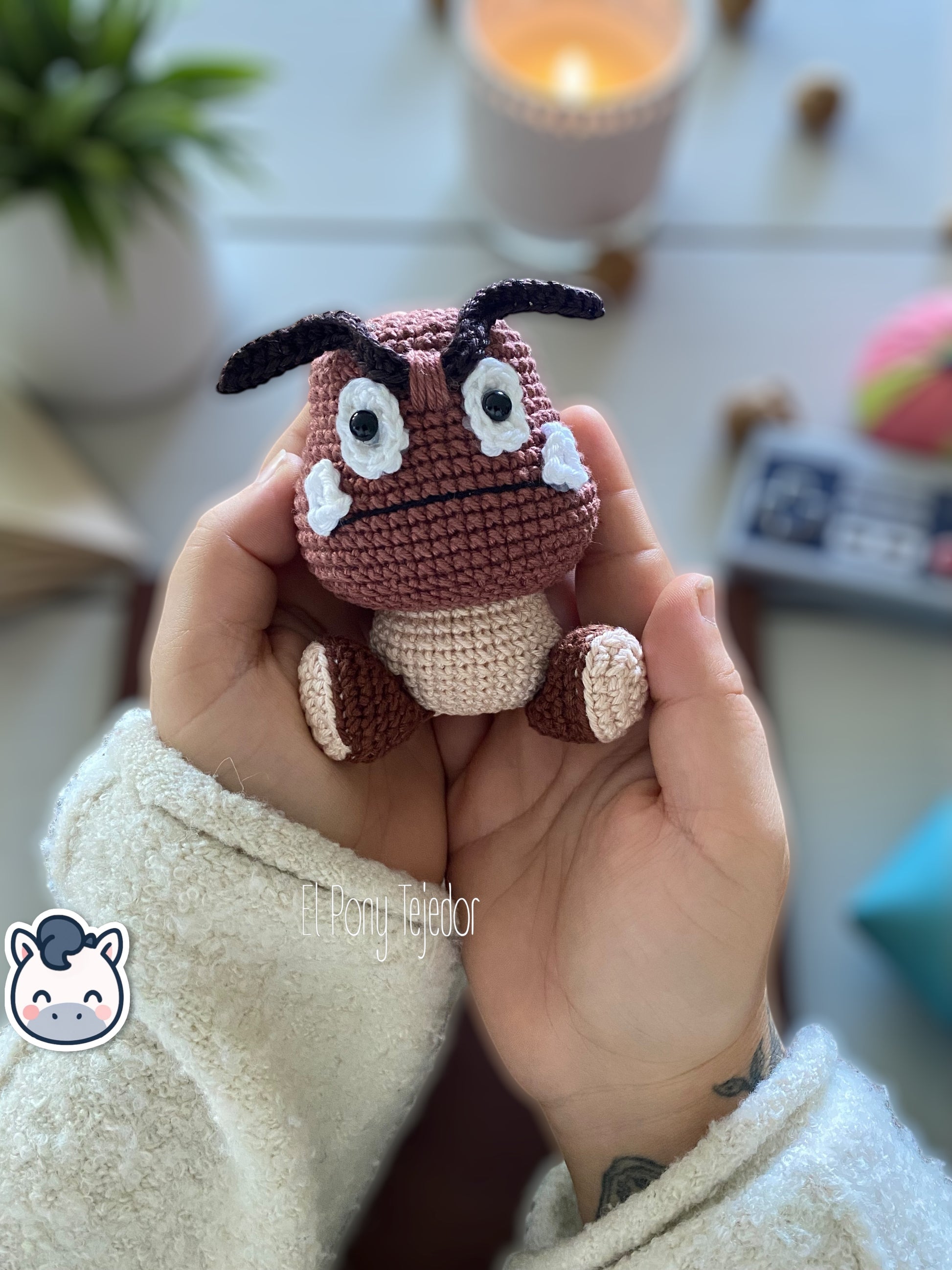 Handmade Goomba amigurumi inspired by Nintendo’s Super Mario Bros, soft crochet plush perfect for Mushroom Kingdom fans and collectors. Artisan plush toy by El Pony Tejedor.