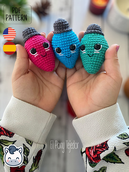 Handmade Christmas light string amigurumi inspired by cozy holiday decor, colorful kawaii Christmas crochet pattern PDF.