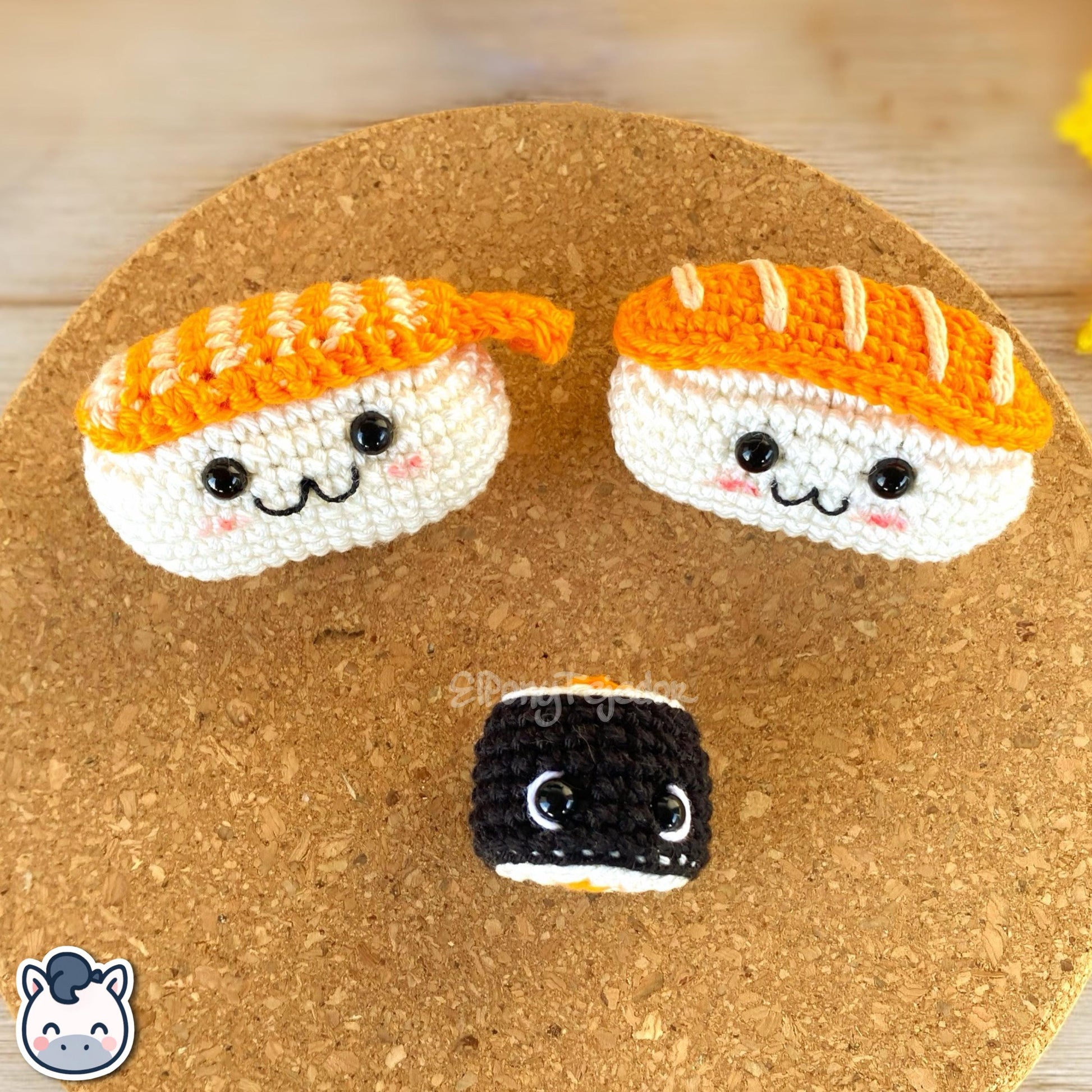 This Nigiri and Maki sushi amigurumi crochet kit includes all materials plus a detailed PDF pattern to create your own handmade kawaii keychains. Inspired by Japanese food, this DIY crochet kit contains yarn, filling, and step-by-step photo instructions to make adorable sushi plushes. Perfect for beginners, sushi lovers, and geek crochet fans. Available in English and Spanish, this kit makes the cutest handmade gift idea for any food lover.