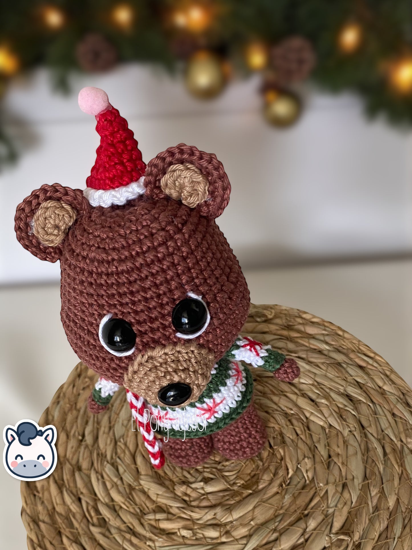 Handmade Christmas Bear plush amigurumi with cozy winter sweater and hat, perfect for Christmas décor and artisanal gift ideas.