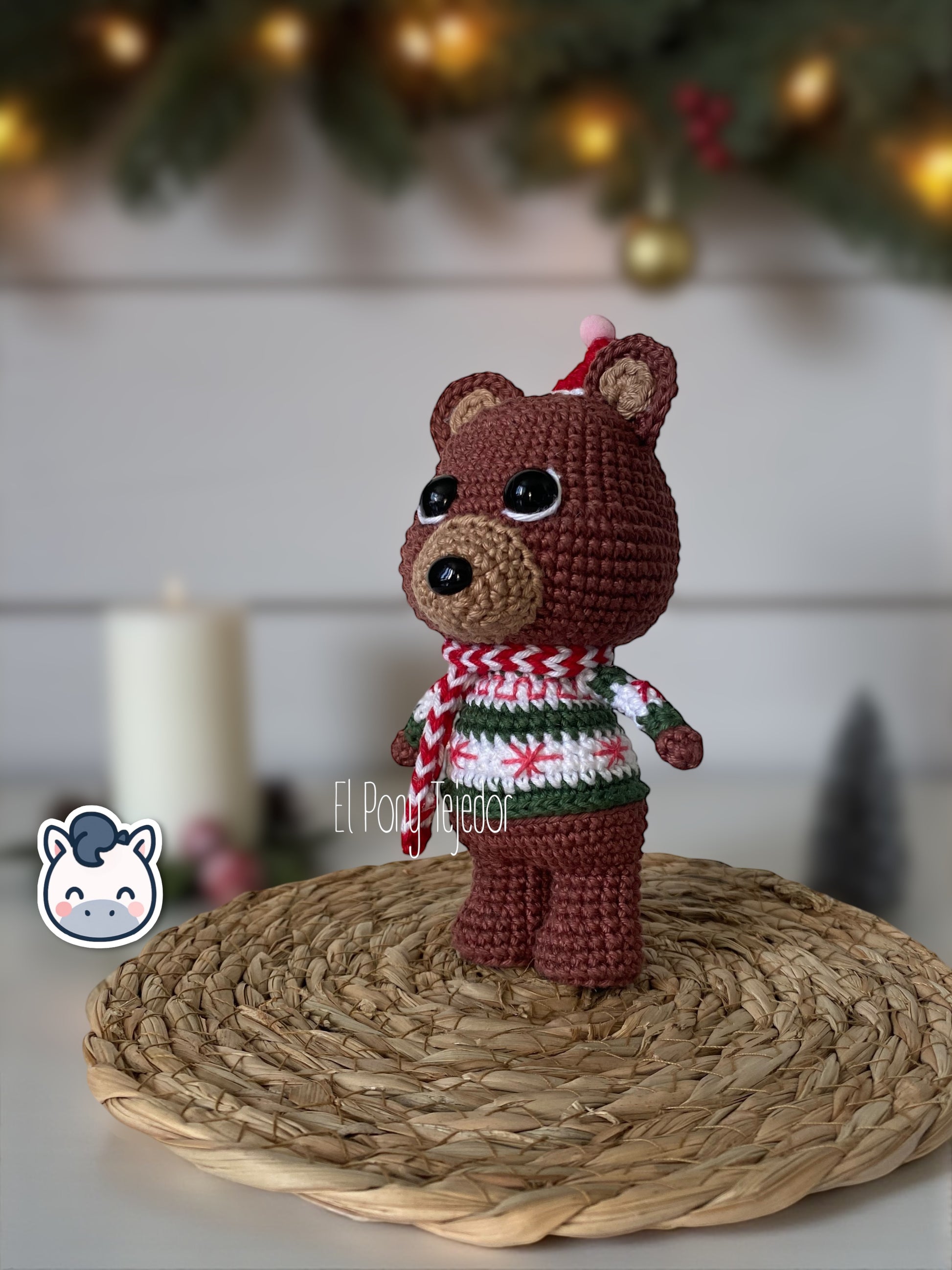 Handmade Christmas Bear plush amigurumi with cozy winter sweater and hat, perfect for Christmas décor and artisanal gift ideas.
