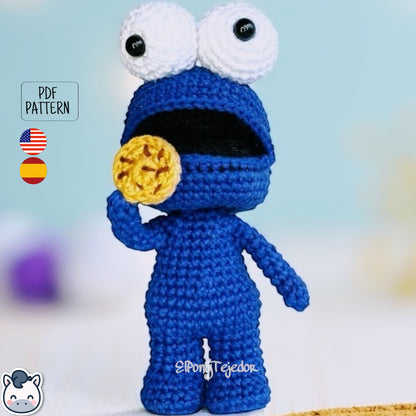 Handmade Cookie Monster amigurumi inspired by Sesame Street, a perfect pattern for fans of cookies, retro TV, and cute geek crochet.