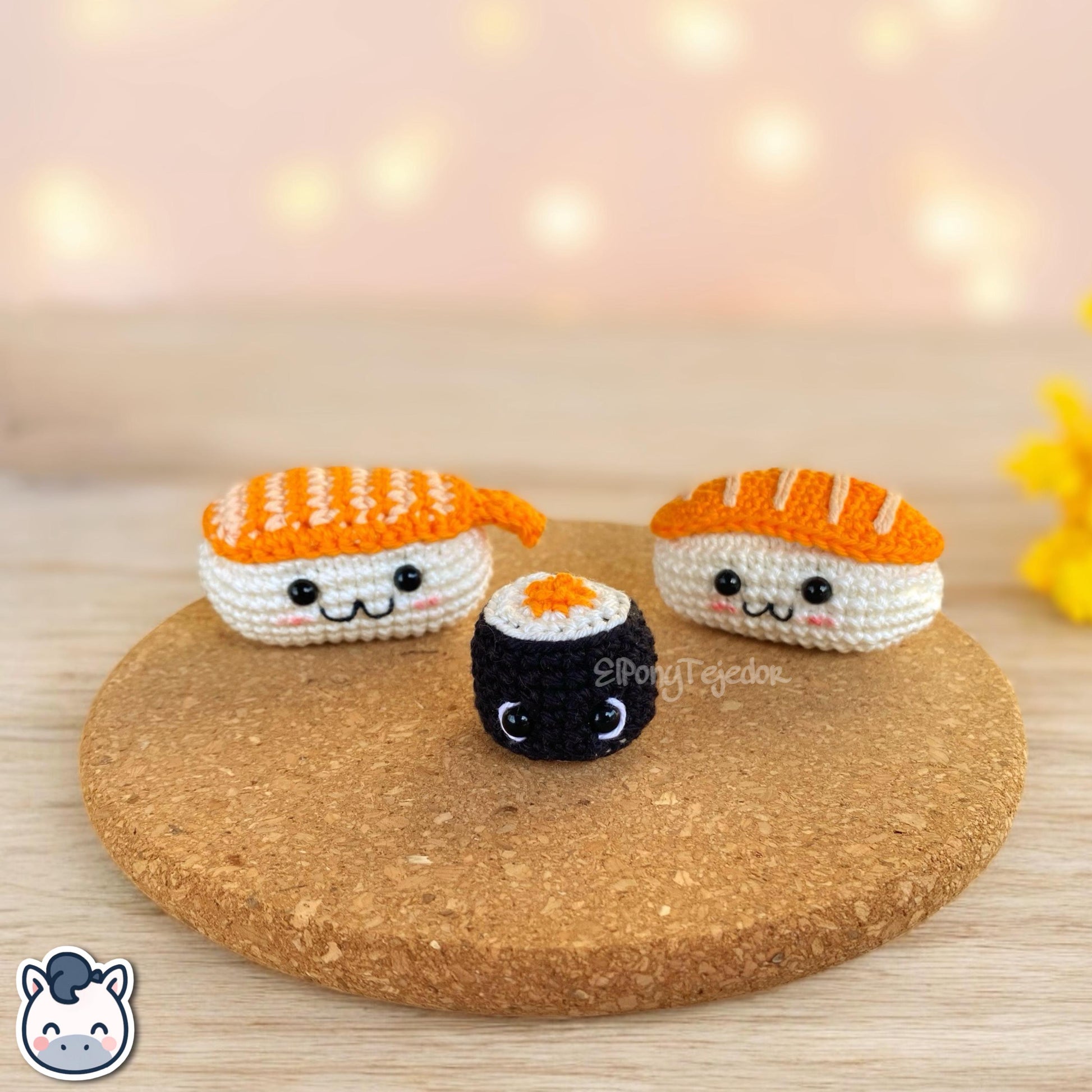 This Nigiri and Maki sushi crochet pattern PDF is a handmade geek amigurumi plush keychain set inspired by cute Japanese food. This kawaii-style crochet pattern includes a full step-by-step photo tutorial to help you make your own adorable sushi nigiri and maki keychains. Perfect for sushi lovers, geek collectors, and handmade enthusiasts. Available in English and Spanish as a digital instant download for your next crochet project.