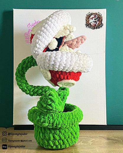 Handmade Piranha Plant amigurumi inspired by Nintendo’s Super Mario Bros., a perfect pattern for fans of Mario, retro gaming, and geek crochet collectibles.