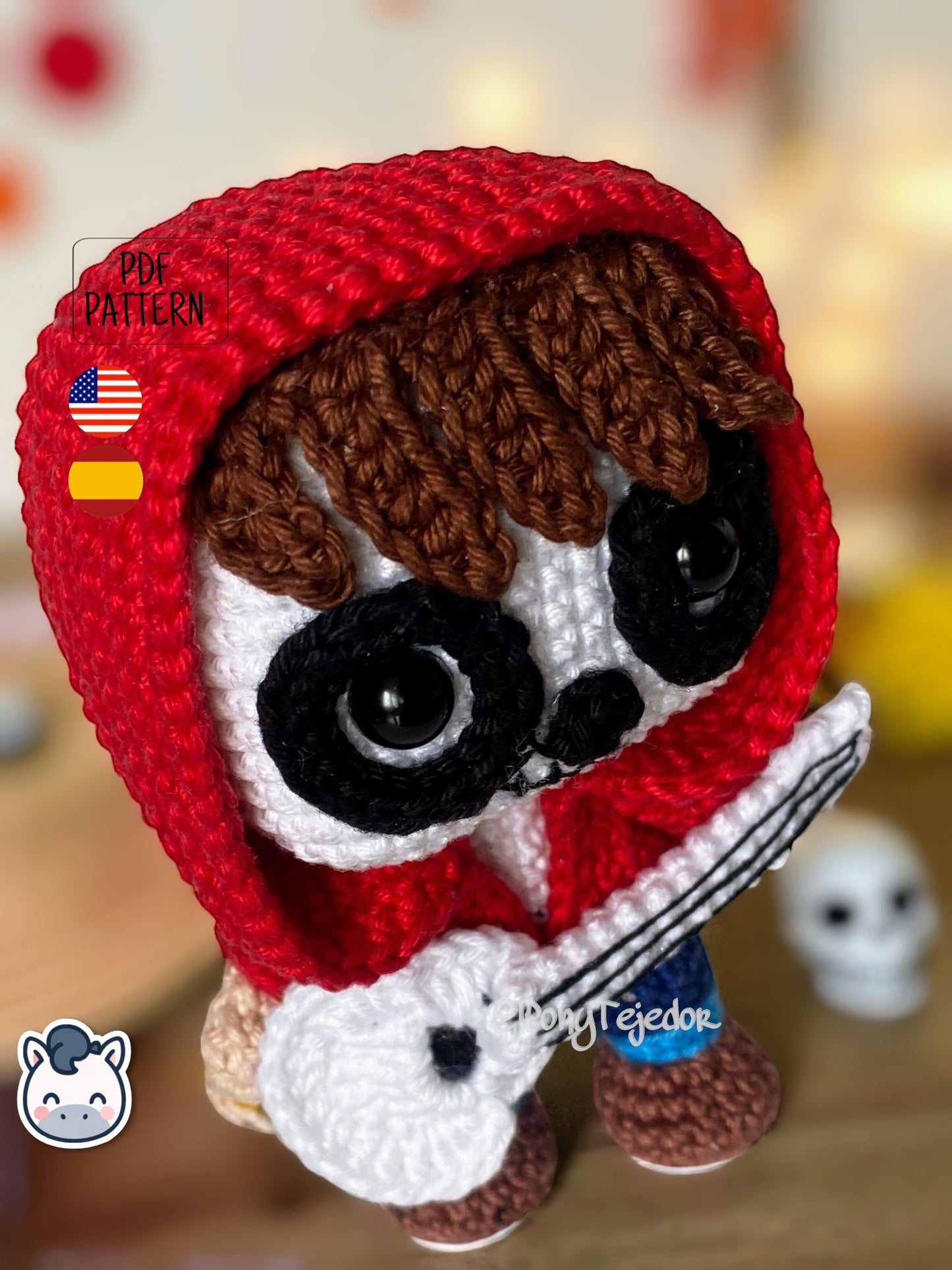 Handmade Miguel amigurumi inspired by Disney and Pixar’s Coco, a perfect pattern for fans of Día de Muertos, Halloween, and musical crochet art.