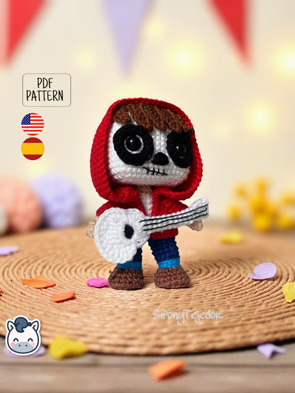 Handmade Miguel amigurumi inspired by Disney and Pixar’s Coco, a perfect pattern for fans of Día de Muertos, Halloween, and musical crochet art.