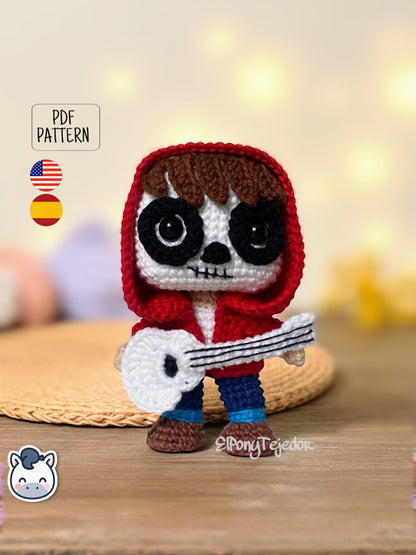 Handmade Miguel amigurumi inspired by Disney and Pixar’s Coco, a perfect pattern for fans of Día de Muertos, Halloween, and musical crochet art.