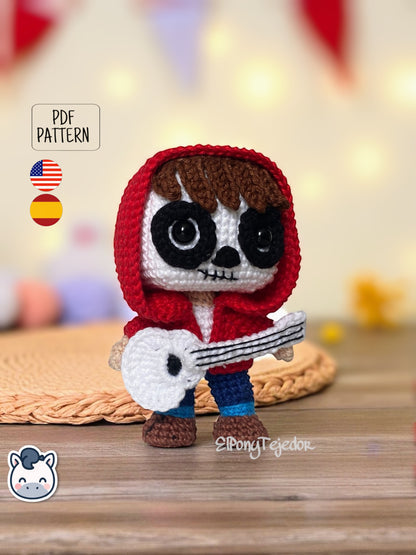 Handmade Miguel amigurumi inspired by Disney and Pixar’s Coco, a perfect pattern for fans of Día de Muertos, Halloween, and musical crochet art.