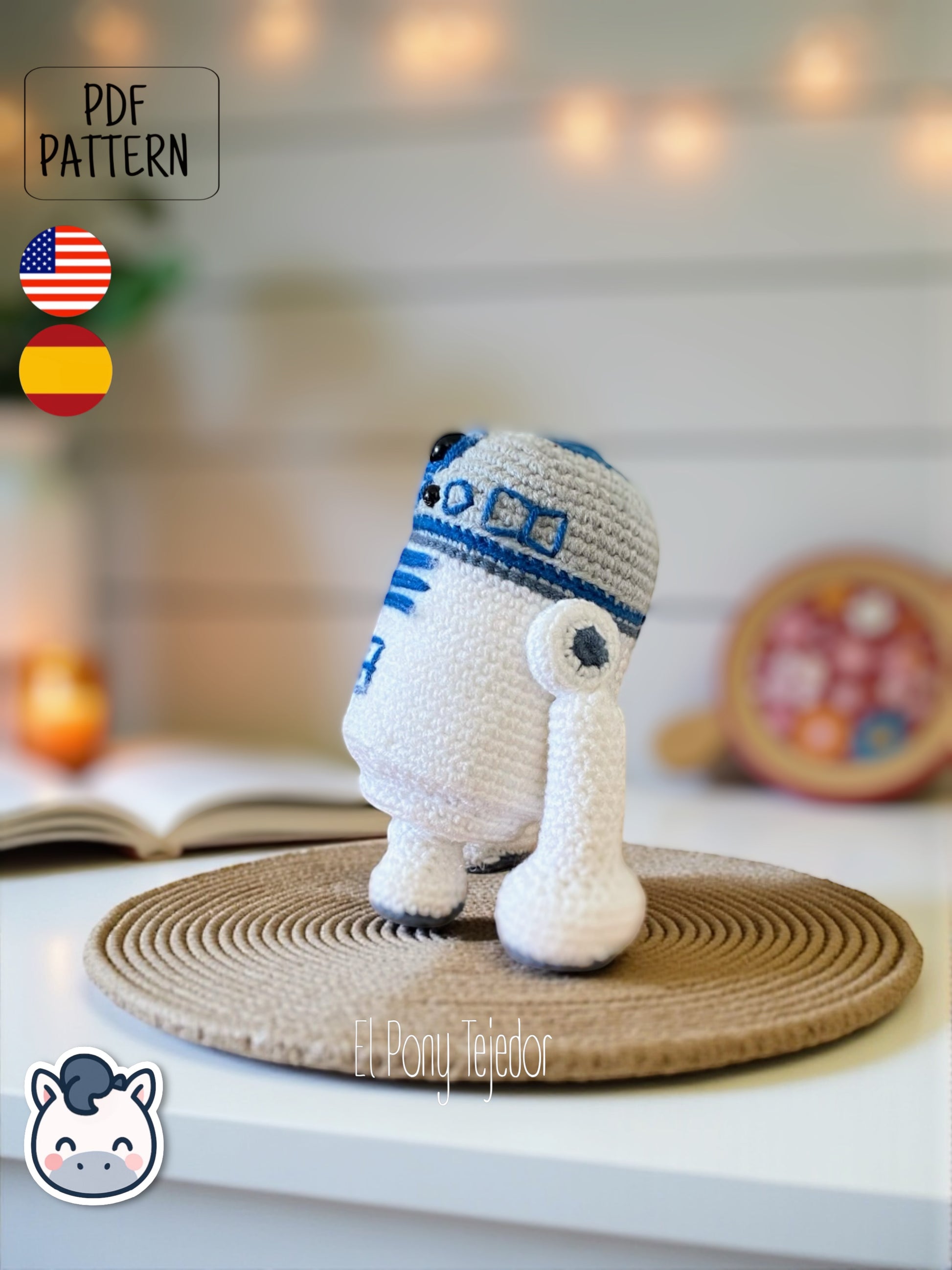 Handmade R2-D2 amigurumi inspired by Star Wars, a perfect pattern for fans of droids, sci-fi adventures, and classic geek crochet collectibles.