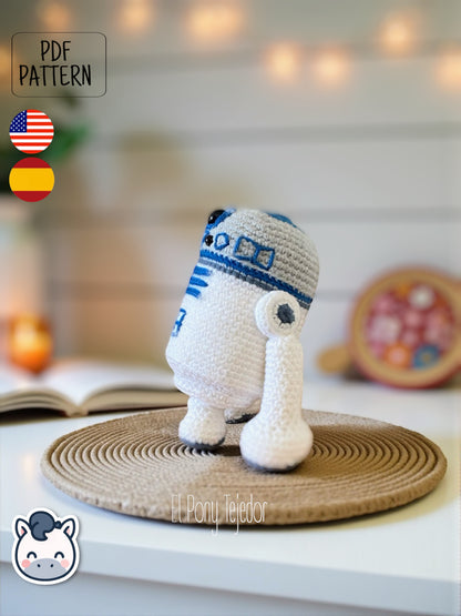 Handmade R2-D2 amigurumi inspired by Star Wars, a perfect pattern for fans of droids, sci-fi adventures, and classic geek crochet collectibles.