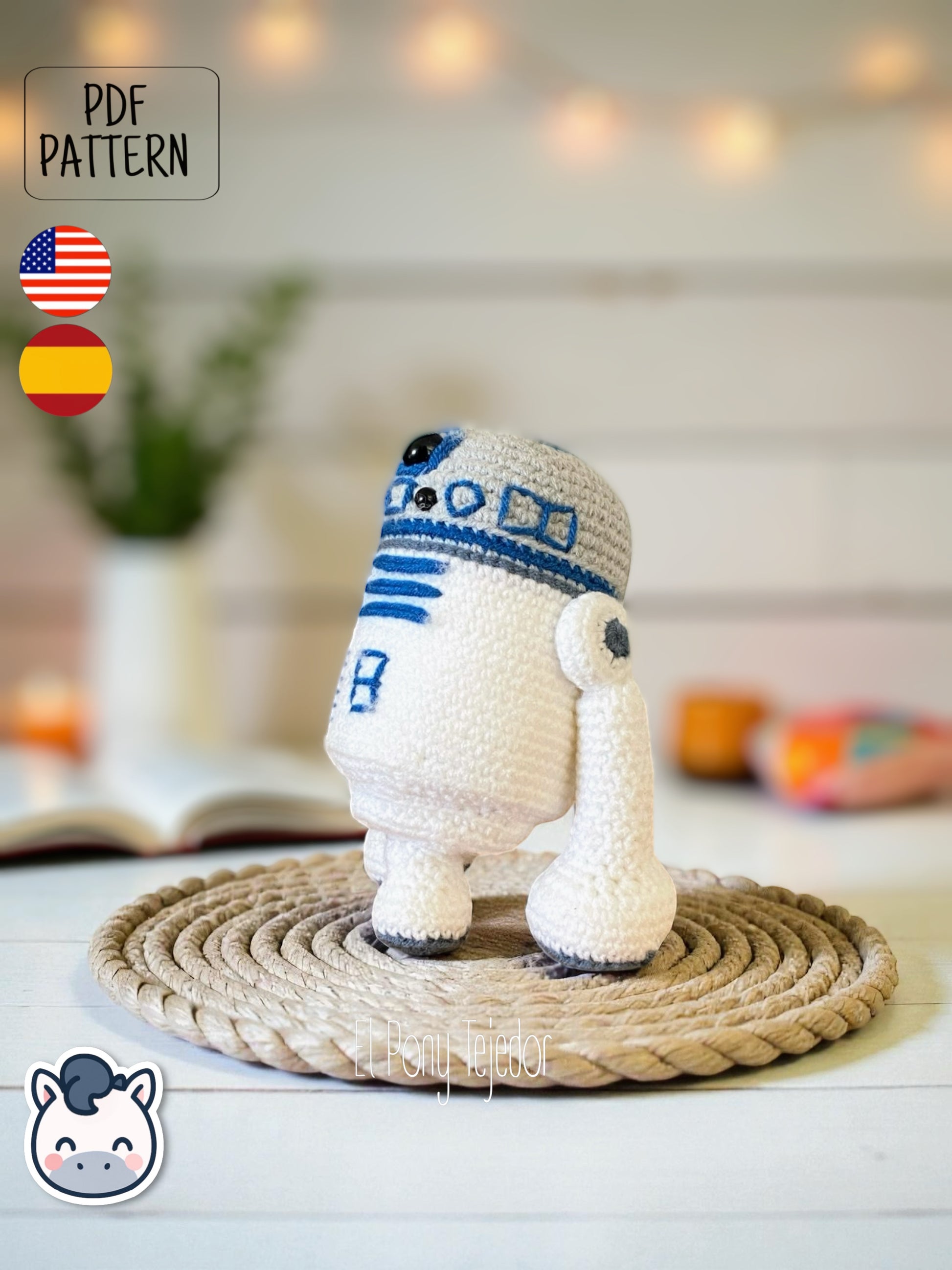 Handmade R2-D2 amigurumi inspired by Star Wars, a perfect pattern for fans of sci-fi, geek culture, and iconic movie collectibles.