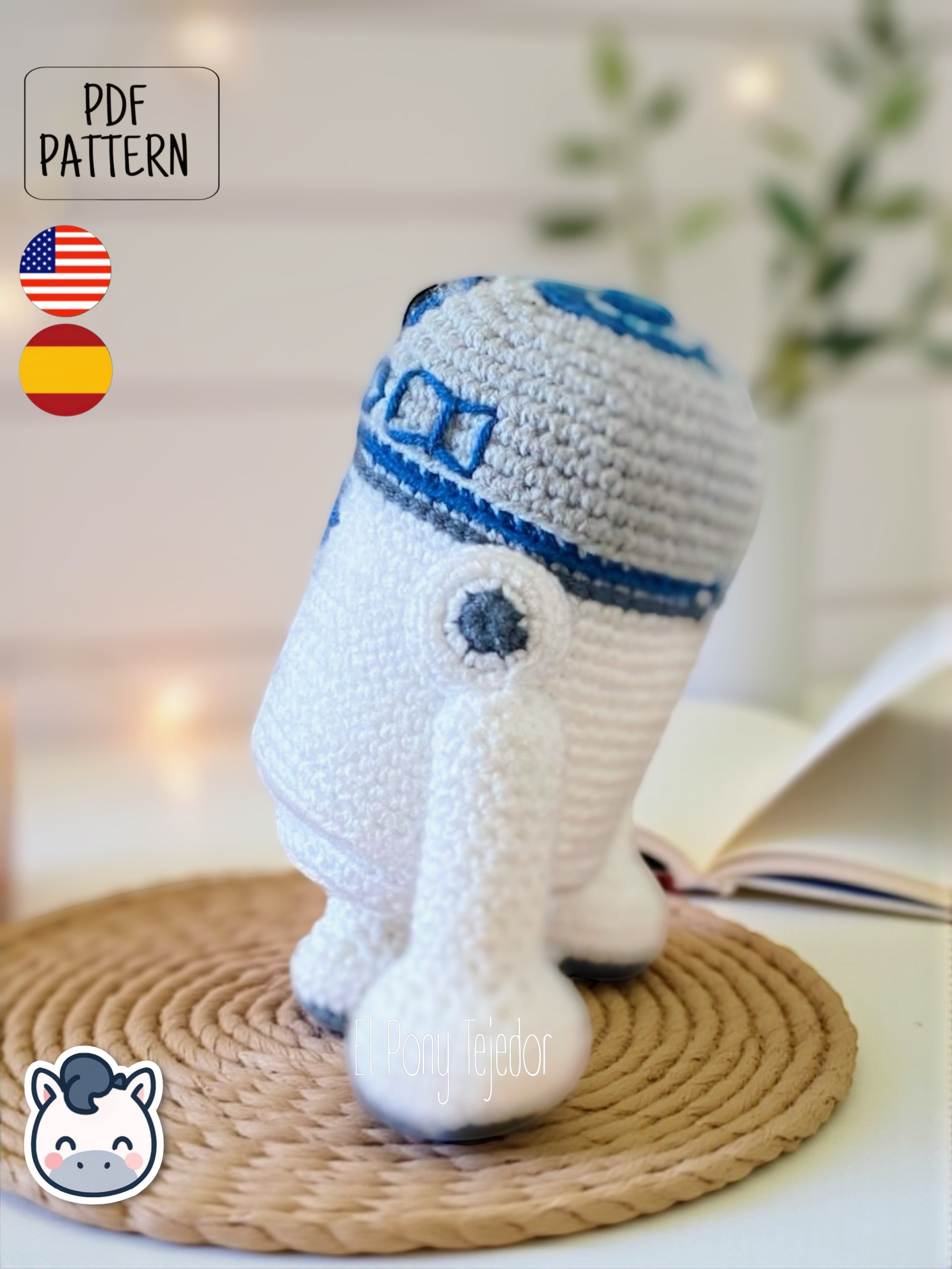 Handmade R2-D2 amigurumi inspired by Star Wars, a perfect pattern for fans of droids, sci-fi adventures, and classic geek crochet collectibles.