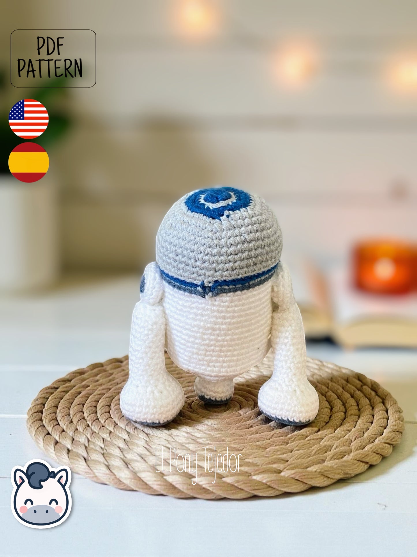 Handmade R2-D2 amigurumi inspired by Star Wars, a perfect pattern for fans of droids, sci-fi adventures, and classic geek crochet collectibles.