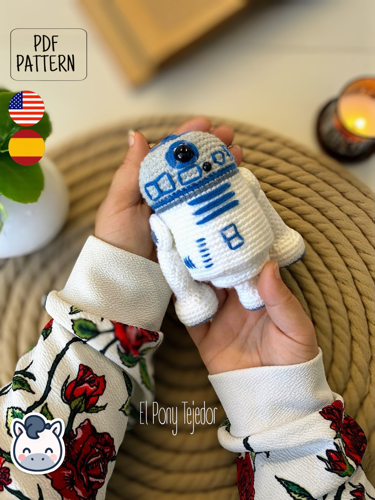 Handmade R2-D2 amigurumi inspired by Star Wars, a perfect pattern for fans of sci-fi, geek culture, and iconic movie collectibles.