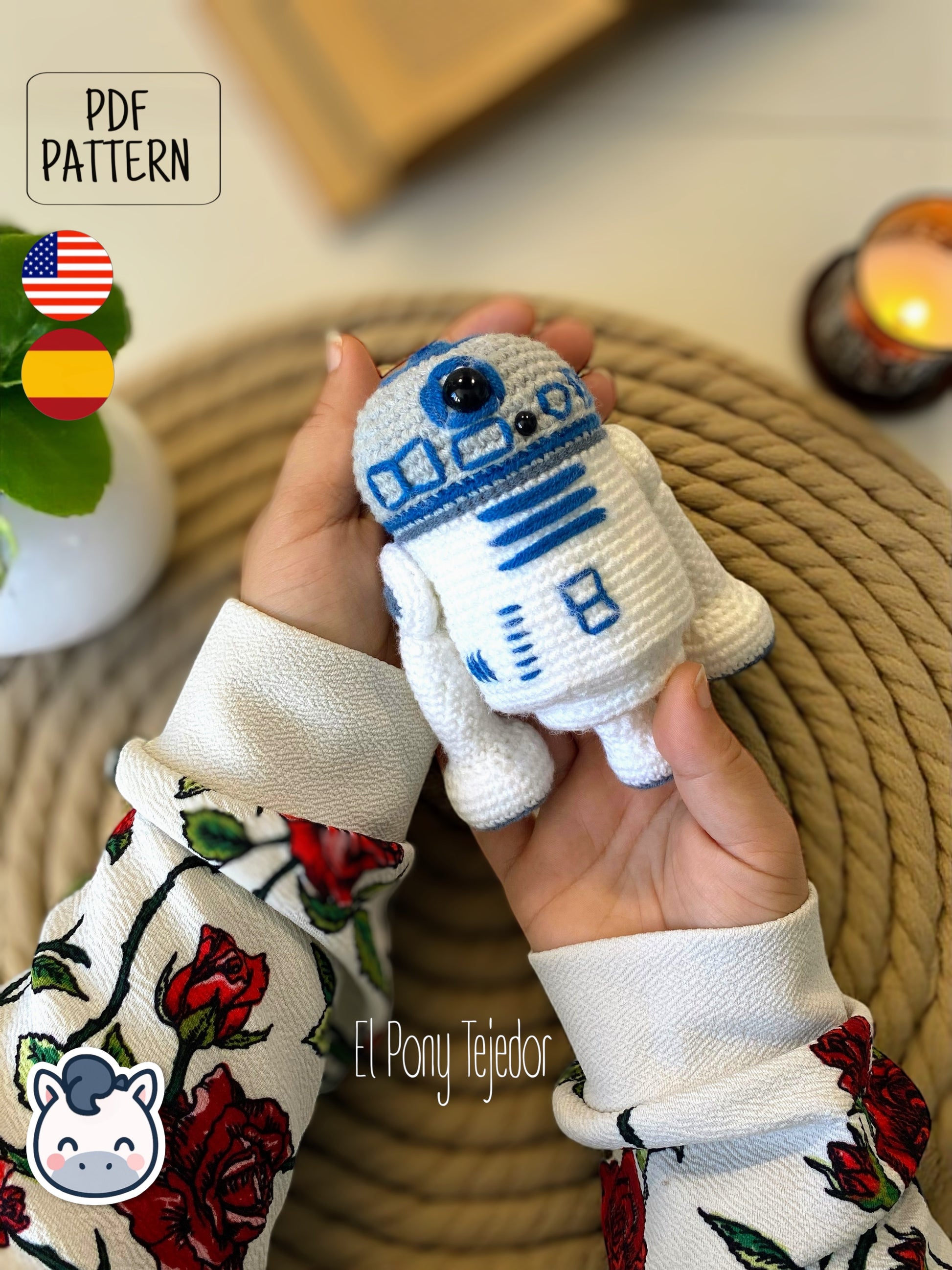 Handmade R2-D2 amigurumi inspired by Star Wars, a perfect pattern for fans of droids, sci-fi adventures, and classic geek crochet collectibles.