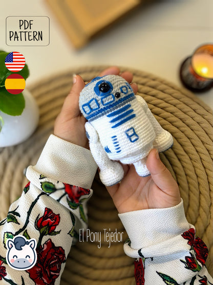 Handmade R2-D2 amigurumi inspired by Star Wars, a perfect pattern for fans of droids, sci-fi adventures, and classic geek crochet collectibles.