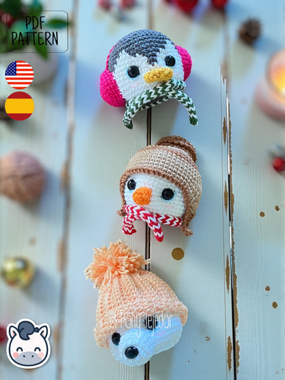 Handmade Christmas amigurumi ornaments featuring a snowman, penguin and polar bear, cute winter crochet pattern PDF for holiday tree decoration.