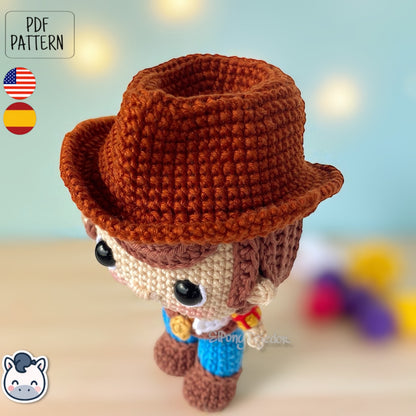 Handmade Woody amigurumi inspired by Disney Pixar’s Toy Story, a perfect crochet pattern for fans of cowboys, Western style, and animation classics.