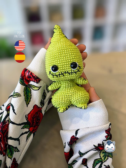 Amigurumi Baby Oogie Boogie inspirado en Pesadilla antes de Navidad, un patrón de crochet adorable y terrorífico perfecto para fans de Disney, Halloween y muñecos estilo geek.