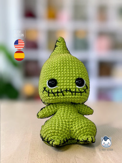 Amigurumi Baby Oogie Boogie inspirado en Pesadilla antes de Navidad, un patrón de crochet adorable y terrorífico perfecto para fans de Disney, Halloween y muñecos estilo geek.