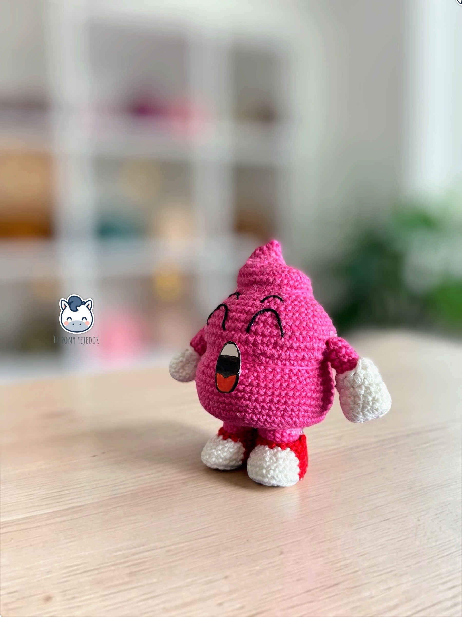 Amigurumi Caca Arale tejido a mano inspirado en Dr. Slump, un divertido patrón de ganchillo kawaii en PDF para fans del anime clásico.