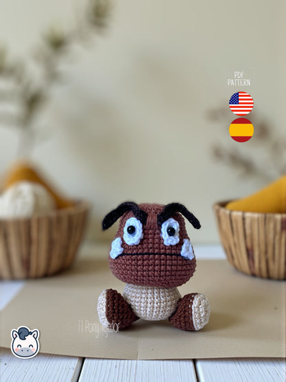 Amigurumi Goomba inspirado en Super Mario Bros, tejido a mano en ganchillo, un patrón PDF perfecto para fans de Nintendo y los videojuegos retro.