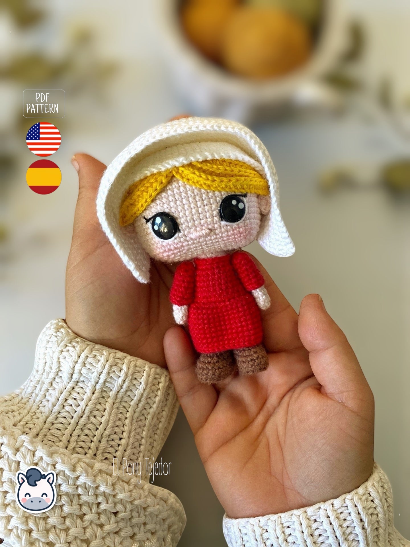Patrón de ganchillo amigurumi de June del cuento de la criada con vestido rojo y cofia blanca, muñeca tejida a crochet.