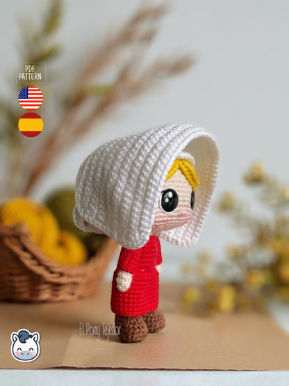 Patrón de ganchillo amigurumi de June del cuento de la criada con vestido rojo y cofia blanca, muñeca tejida a crochet.