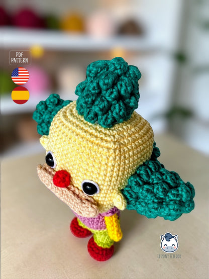 Amigurumi de Krusty el Payaso inspirado en Los Simpson, un patrón de ganchillo geek y colorido perfecto para fans de Springfield y muñecos estilo coleccionable.