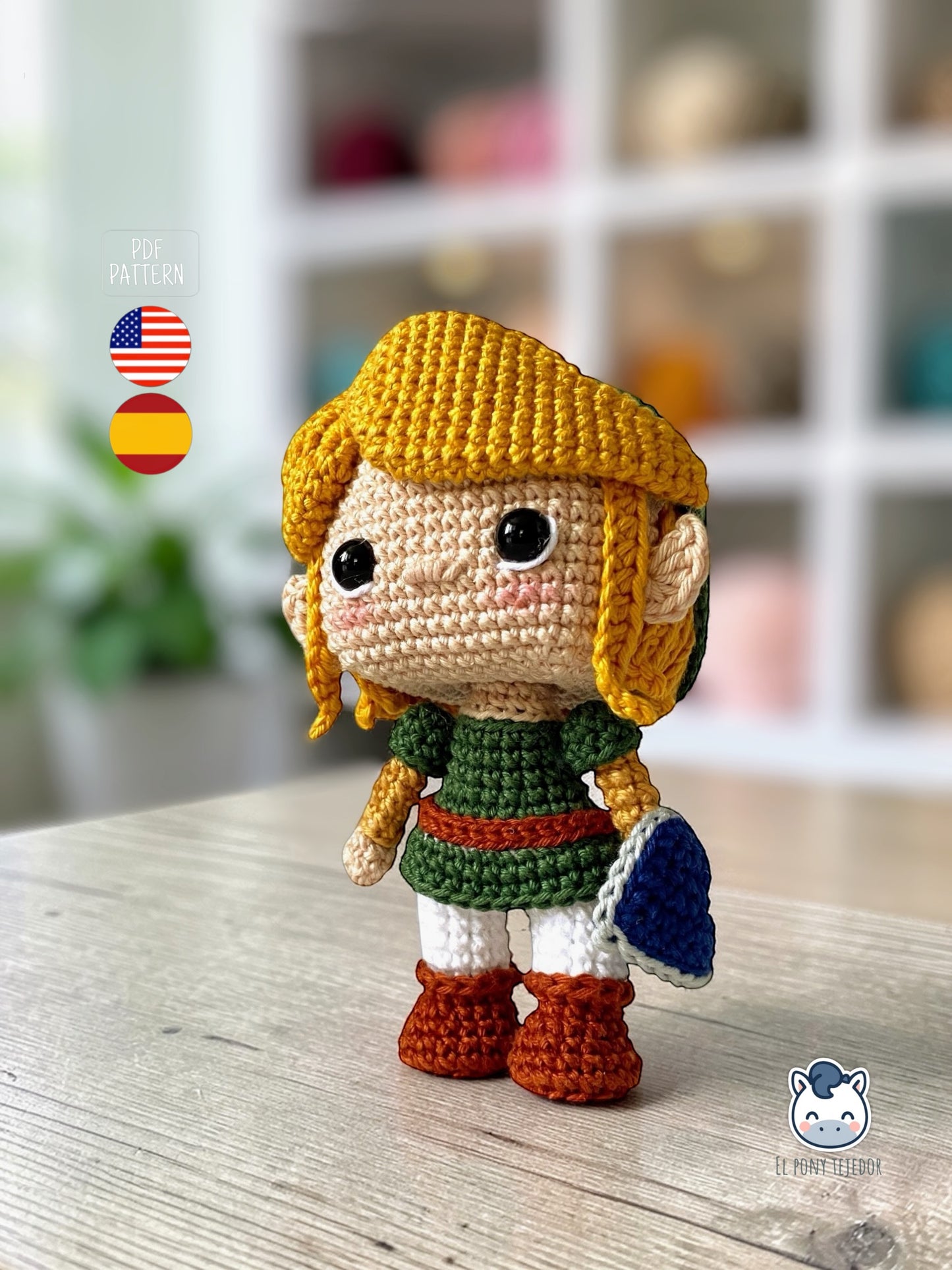 Handmade Link amigurumi inspired by The Legend of Zelda, a geek crochet pattern PDF in Funko style for Nintendo fans. Amigurumi de Link inspirado en The Legend of Zelda, un patrón de ganchillo estilo Funko perfecto para fans de Nintendo y videojuegos.