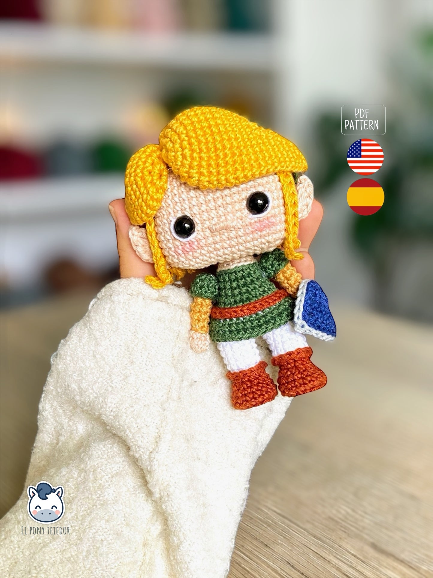 Handmade Link amigurumi inspired by The Legend of Zelda, a geek crochet pattern PDF in Funko style for Nintendo fans. Amigurumi de Link inspirado en The Legend of Zelda, un patrón de ganchillo estilo Funko perfecto para fans de Nintendo y videojuegos.