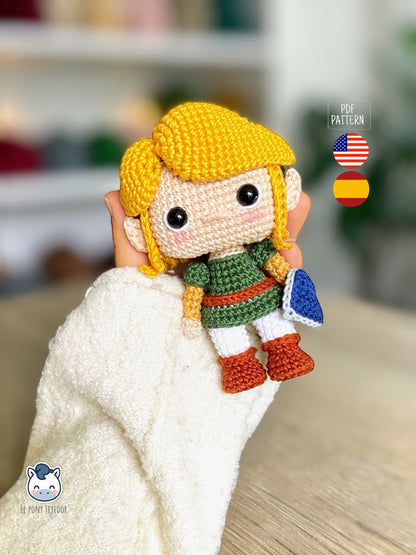 Handmade Link amigurumi inspired by The Legend of Zelda, a geek crochet pattern PDF in Funko style for Nintendo fans. Amigurumi de Link inspirado en The Legend of Zelda, un patrón de ganchillo estilo Funko perfecto para fans de Nintendo y videojuegos.
