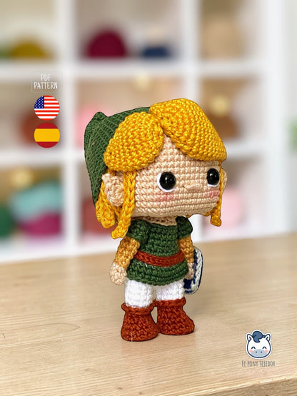 Handmade Link amigurumi inspired by The Legend of Zelda, a geek crochet pattern PDF in Funko style for Nintendo fans. Amigurumi de Link inspirado en The Legend of Zelda, un patrón de ganchillo estilo Funko perfecto para fans de Nintendo y videojuegos.