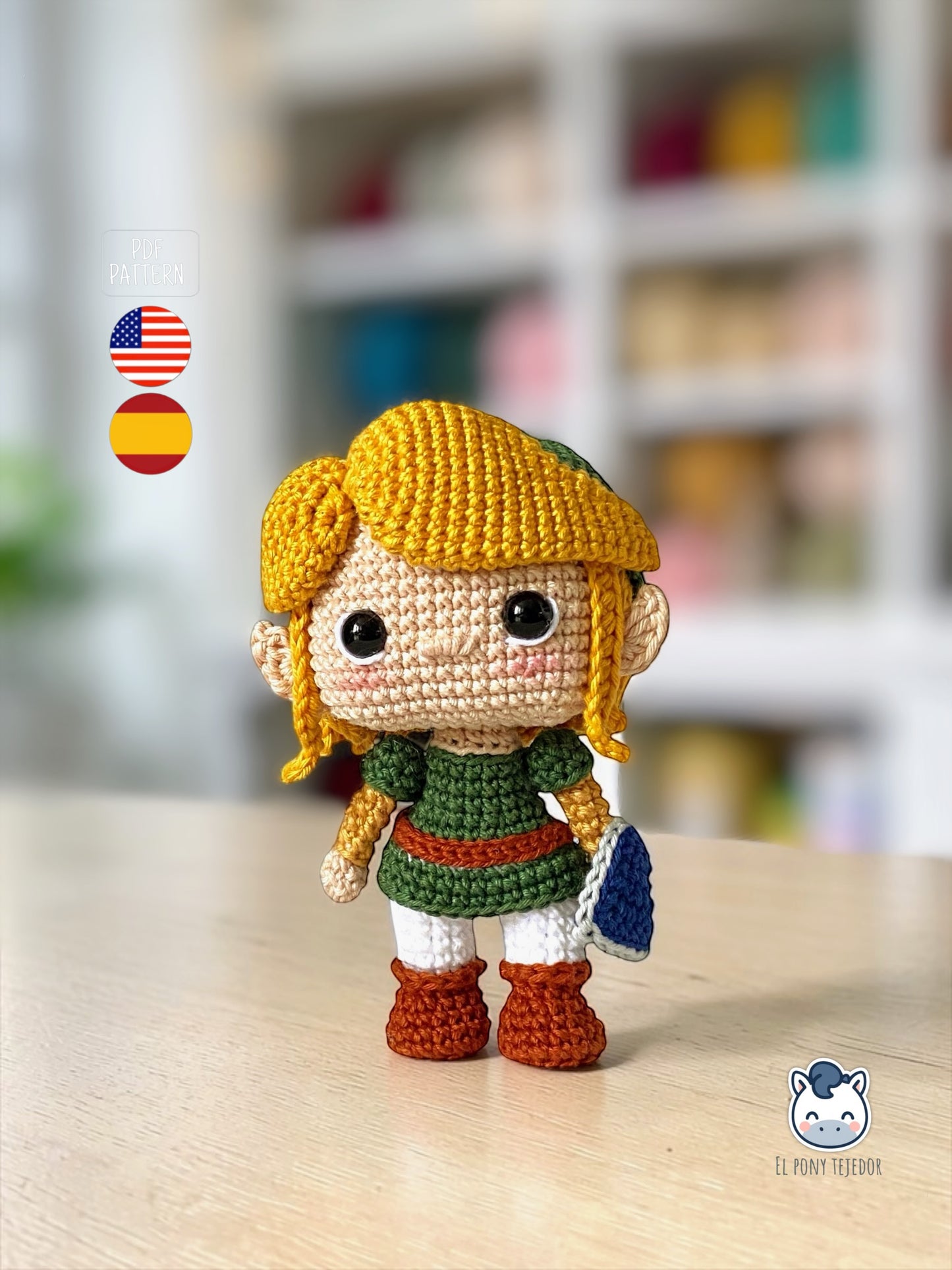 Handmade Link amigurumi inspired by The Legend of Zelda, a geek crochet pattern PDF in Funko style for Nintendo fans. Amigurumi de Link inspirado en The Legend of Zelda, un patrón de ganchillo estilo Funko perfecto para fans de Nintendo y videojuegos.