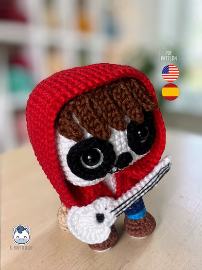 Amigurumi de Miguel inspirado en Coco de Disney Pixar con guitarra blanca y sudadera roja, patrón digital PDF estilo Funko perfecto para fans del Día de los Muertos y coleccionistas geek.