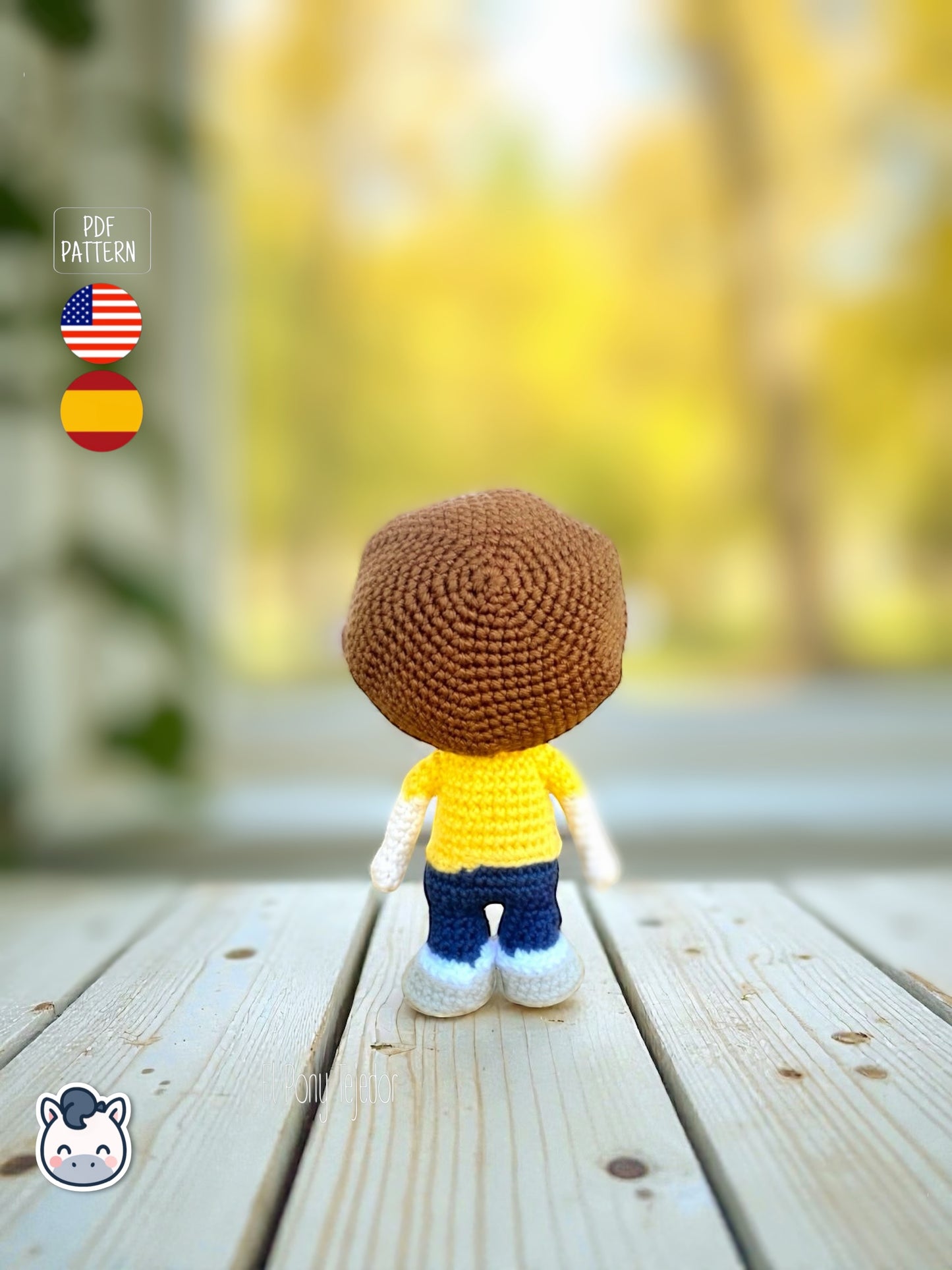 Rick and Morty amigurumi crochet dolls with white lab coat, blue spiky hair and iconic expressions, displayed on a natural background.