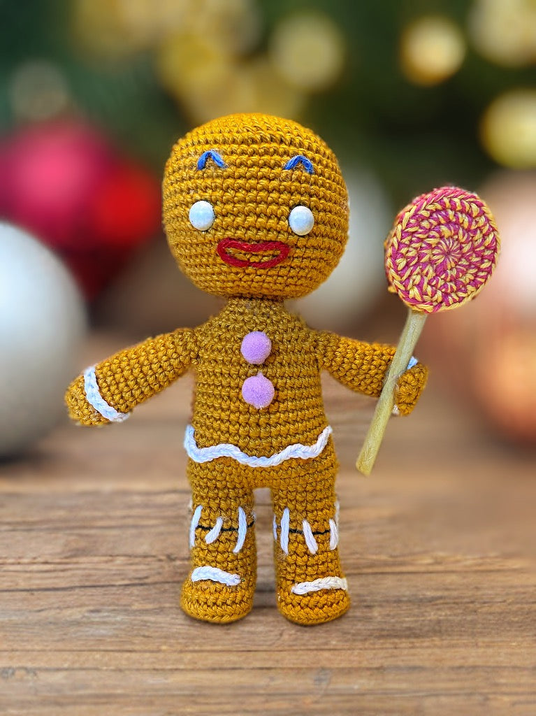 Handmade Gingerbread Man amigurumi inspired by Shrek, cute crochet pattern PDF for geek and kawaii fans.