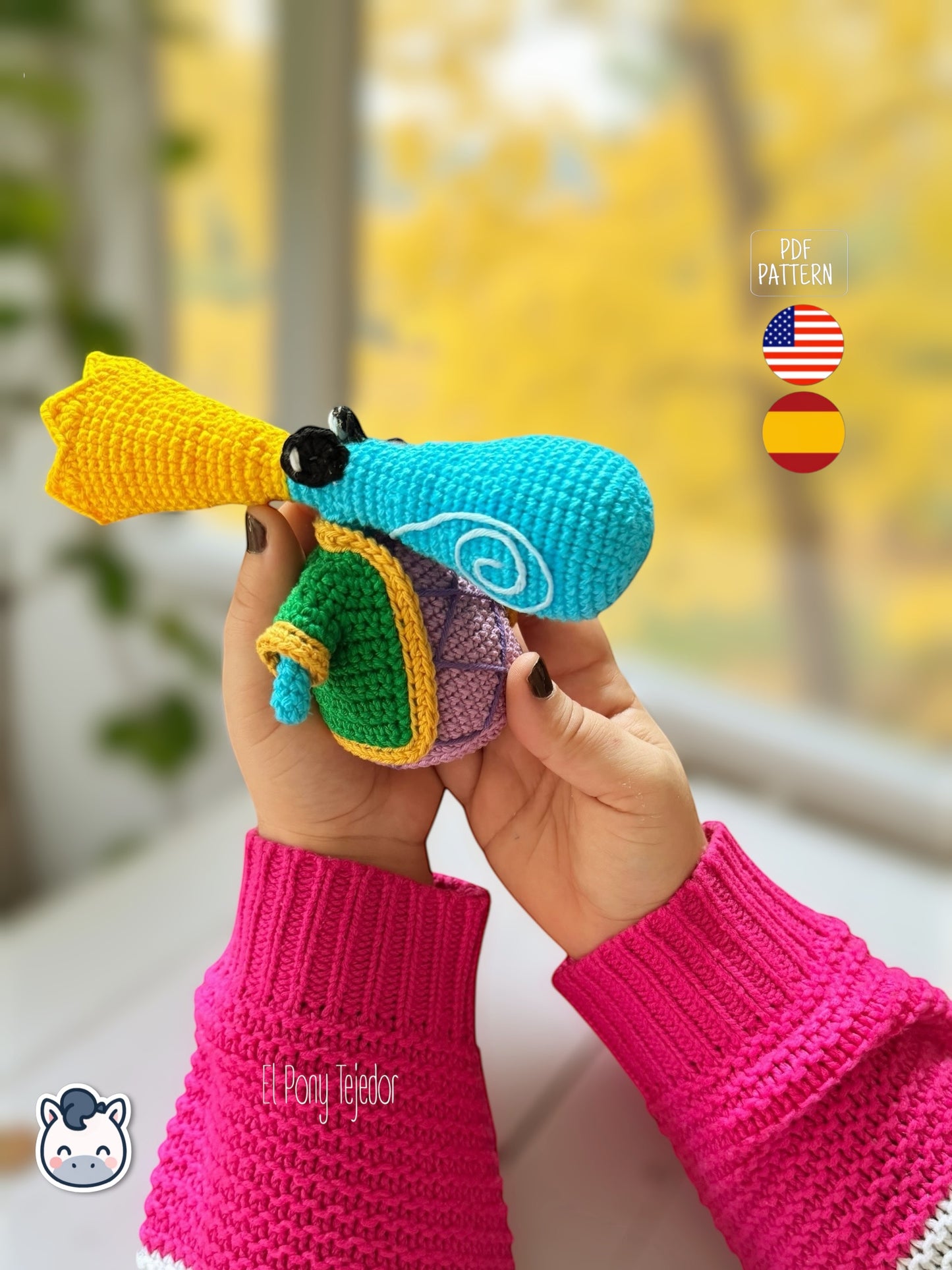 Amigurumi Rayman Diminuto (Teensies) tejido a mano, inspirado en el videojuego Rayman, patrón de crochet mini y colorido para fans gamers y geek.