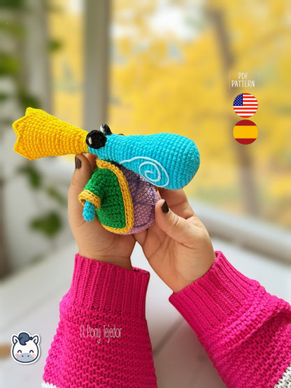 Amigurumi Rayman Diminuto (Teensies) tejido a mano, inspirado en el videojuego Rayman, patrón de crochet mini y colorido para fans gamers y geek.